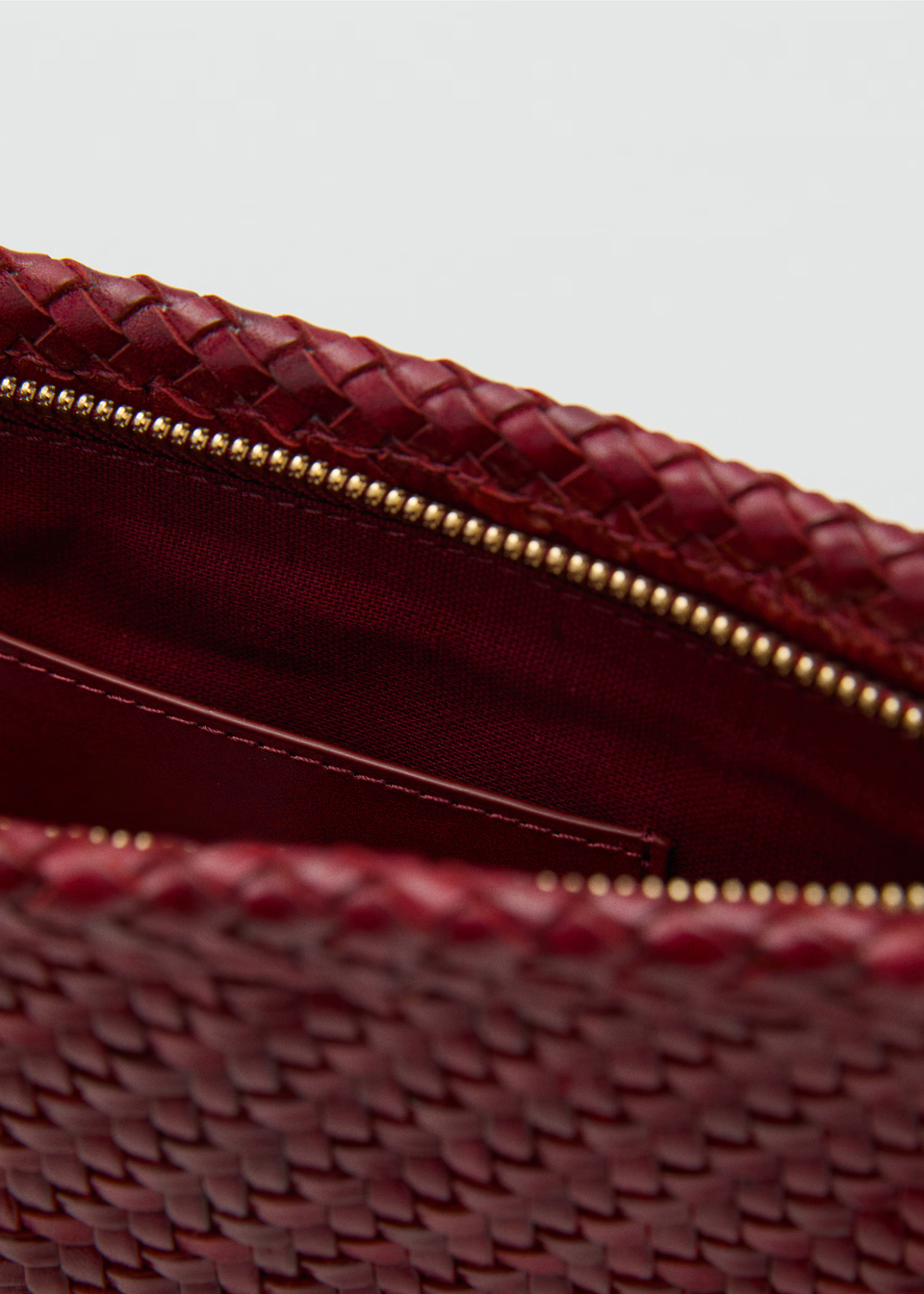CLUTCH TRIANA - CUERO TRENZADO BURDEOS
